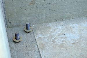 Setting the Hoistway - Leveling the hoistway for the modular elevator is very important. It starts with anchor bolts and leveling nuts and washers.
