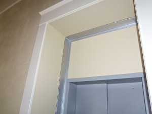 Expansion plates can be used or the hoistway can be tied directly to the building.